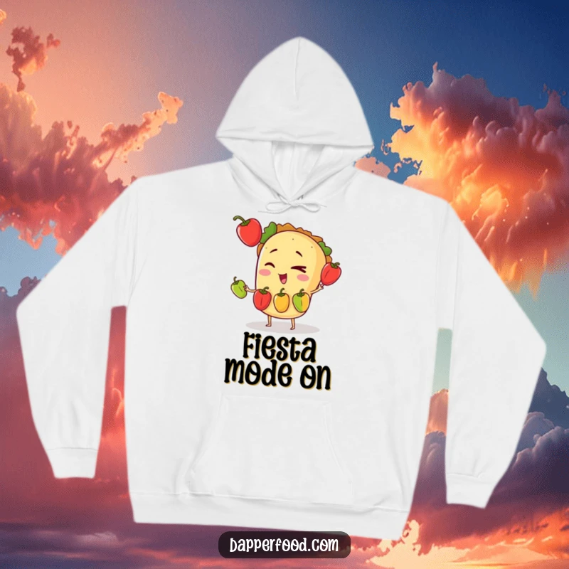 Funny hoodie design of a winking taco character skillfully keeping three tiny bell peppers in the air, a true performer.