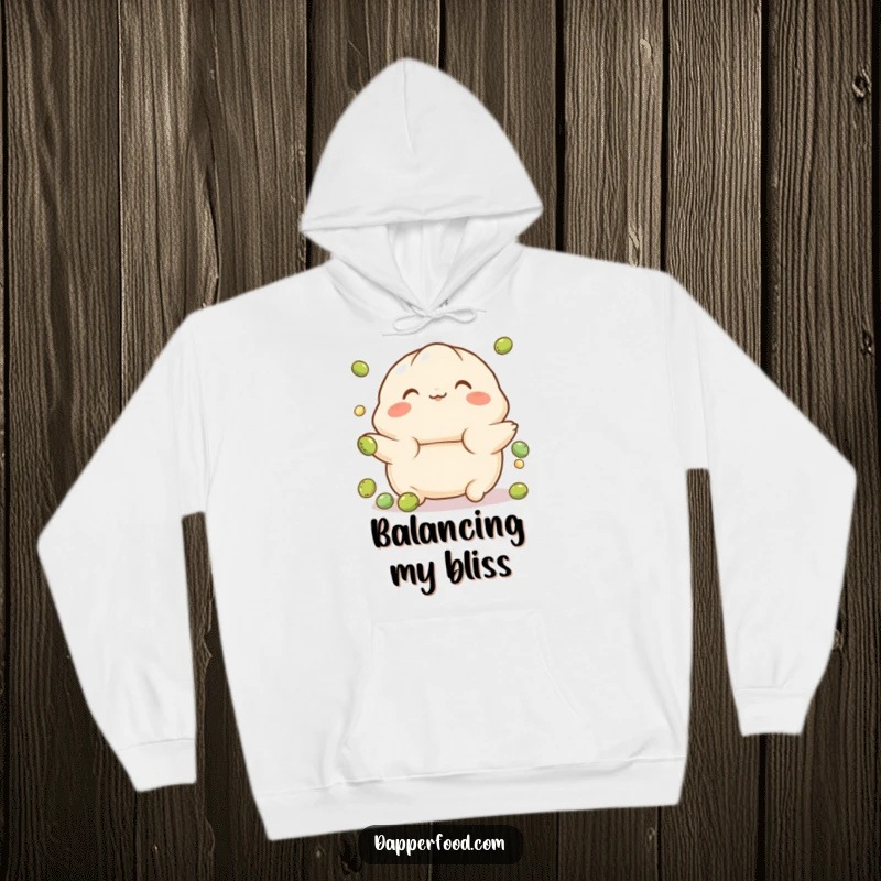 Funny Dumpling Hoodie featuring a playful character with rosy cheeks, balancing on a tiny ball, offering cozy comfort and adorable charm.