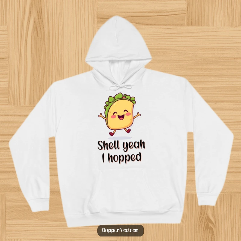 Funny Taco Hop Hoodie featuring a cheerful smiling taco character with legs doing a joyful hop, perfect for cozy humor.