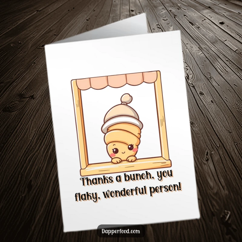 Funny free printable thank you card of a curious croissant with eyes and a hat, peeking from a window with thanks.