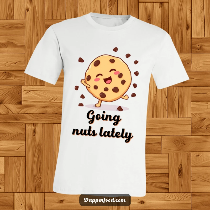 Funny cookie t-shirt with chocolate chips flying as it attempts a cartwheel, capturing a moment of sweet, chaotic joy. A fantastic funny gift.