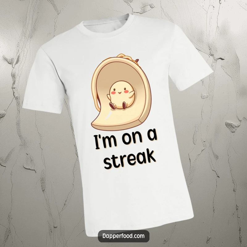 Funny anthropomorphic dumpling character happily sliding down a noodle, printed on a t-shirt for a playful, food-themed look.