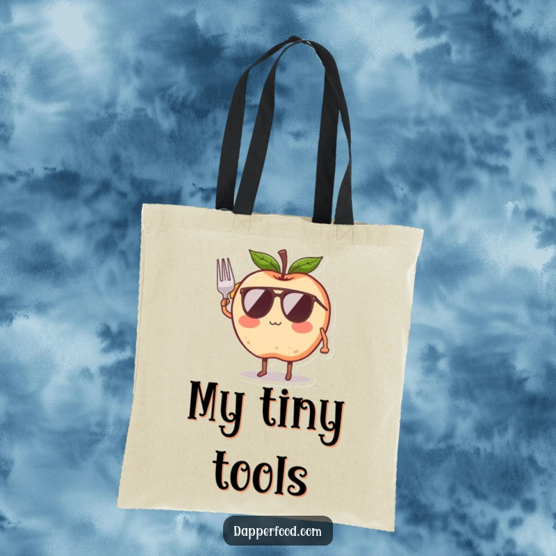Funny tote bag with a blushing apple character wearing sunglasses and using a tiny fork to salute, perfect for carrying items in style.